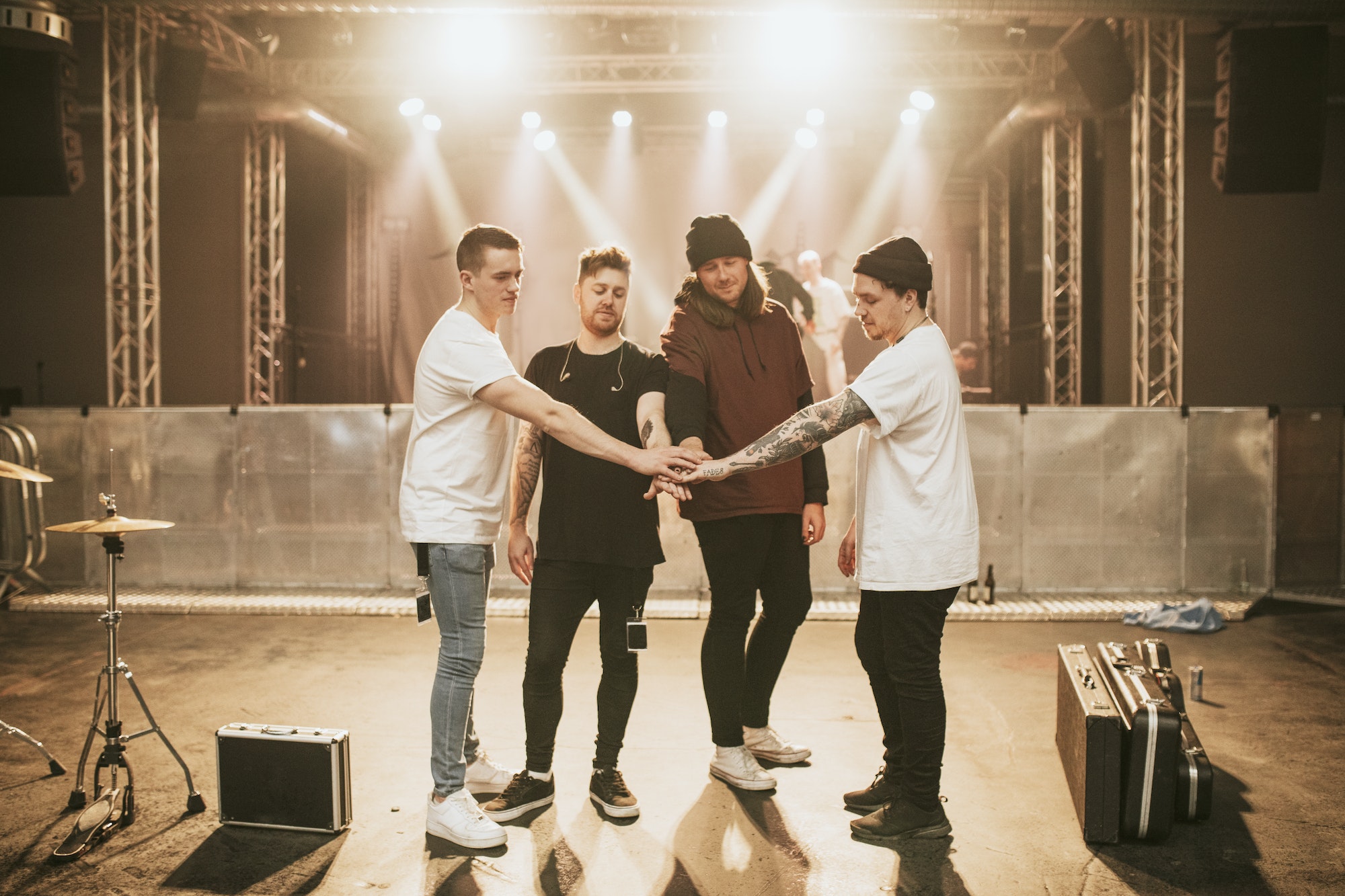 band-stacking-hands-before-a-concert.jpg